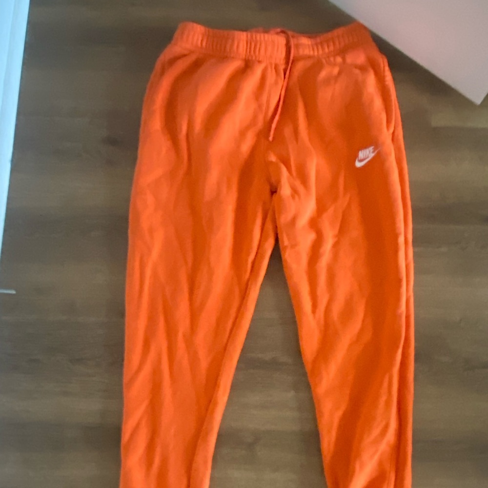 Orange Nike sweats